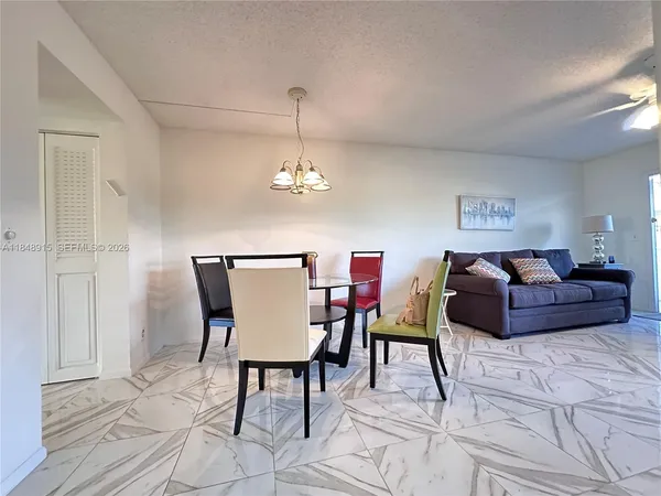 a view of a dining room with furniture