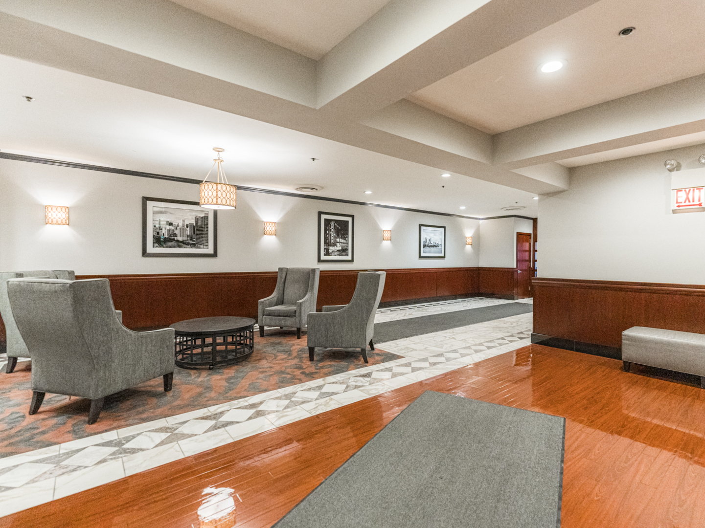 40 East 9th Street, Unit 1502 Chicago, IL 60605 - Photo 36 of 36 a living room with furniture and wooden floor
