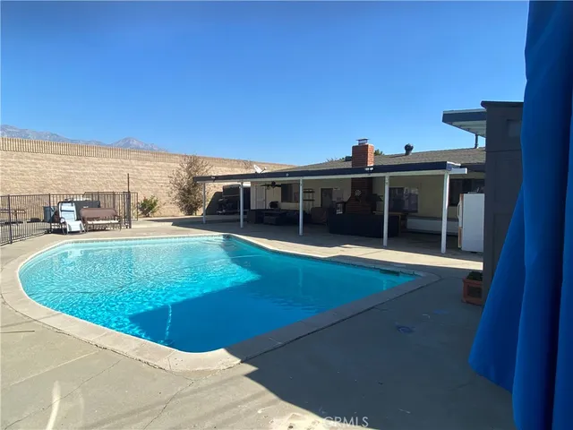a view of a house with a swimming pool