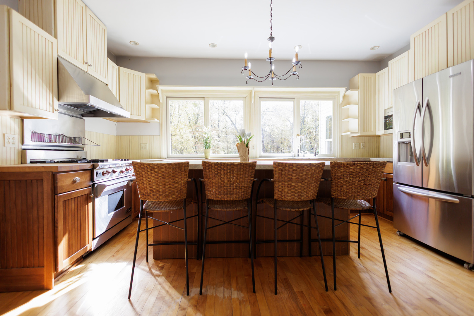 5034 East Boy Scout Road St. Anne, IL 60964 - Photo 11 of 50 a kitchen with a dining table chairs and refrigerator