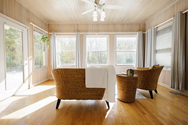 a living room with furniture and a window