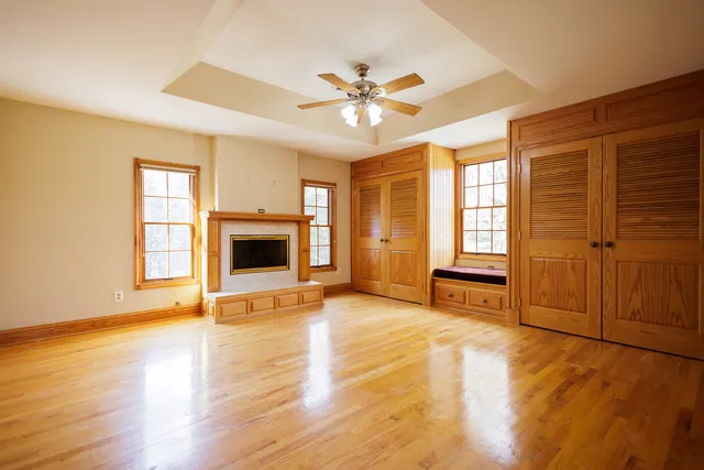 a bathroom with a sink a large mirror and a bathtub