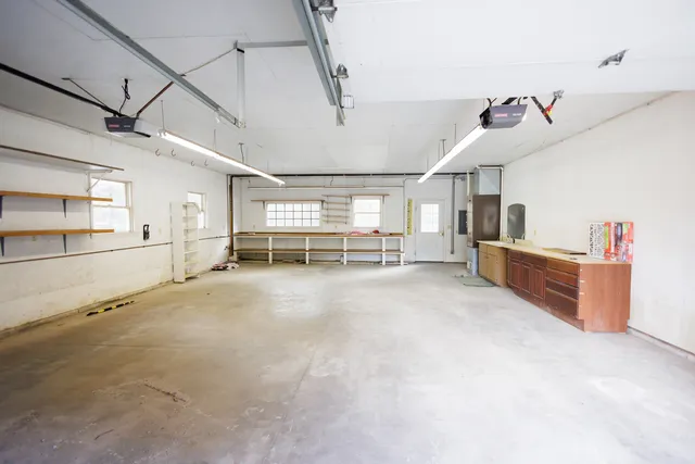 a view of empty room with windows