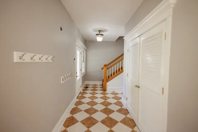 a view of a hallway with a window