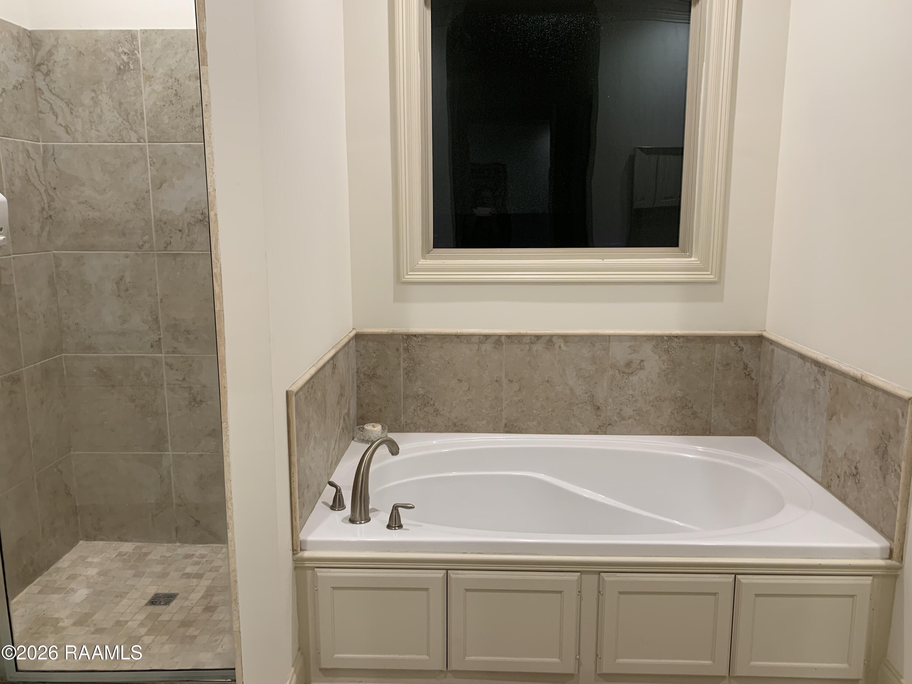 115 Sugar Ridge Lane Youngsville, LA 70592 - Photo 12 of 31 Primary Bathroom Tub/shower location