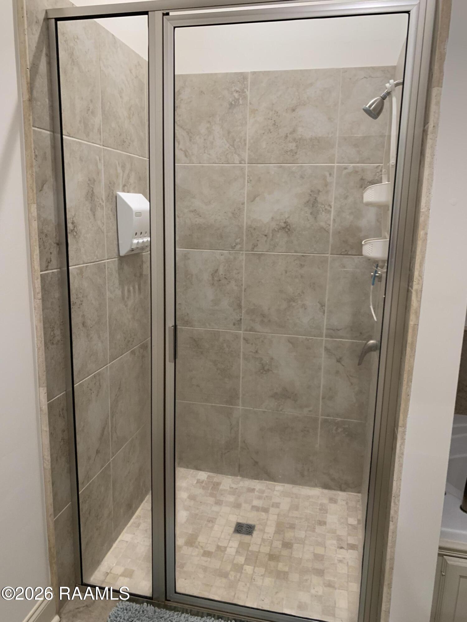 115 Sugar Ridge Lane Youngsville, LA 70592 - Photo 14 of 31 Walk in Tiled Shower