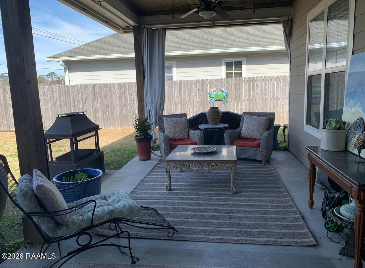 115 Sugar Ridge Lane Youngsville, LA 70592 - Photo 23 of 31 Covered Patio