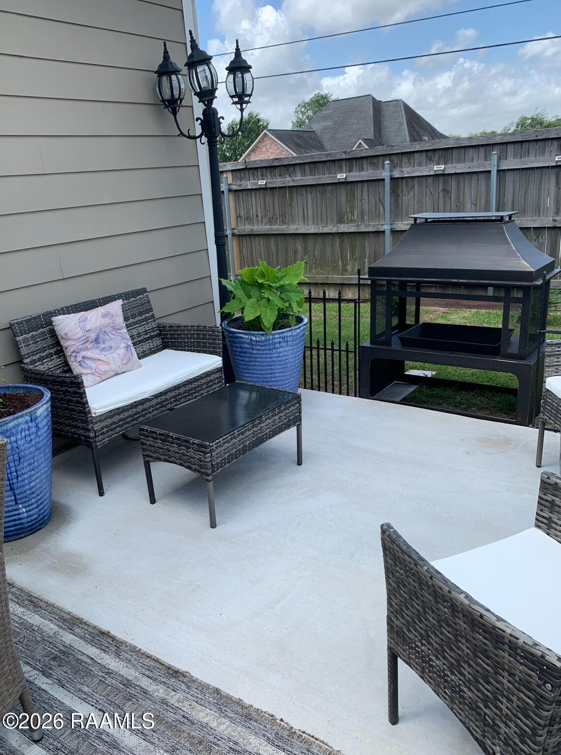 115 Sugar Ridge Lane Youngsville, LA 70592 - Photo 26 of 31 Open Patio Area End view