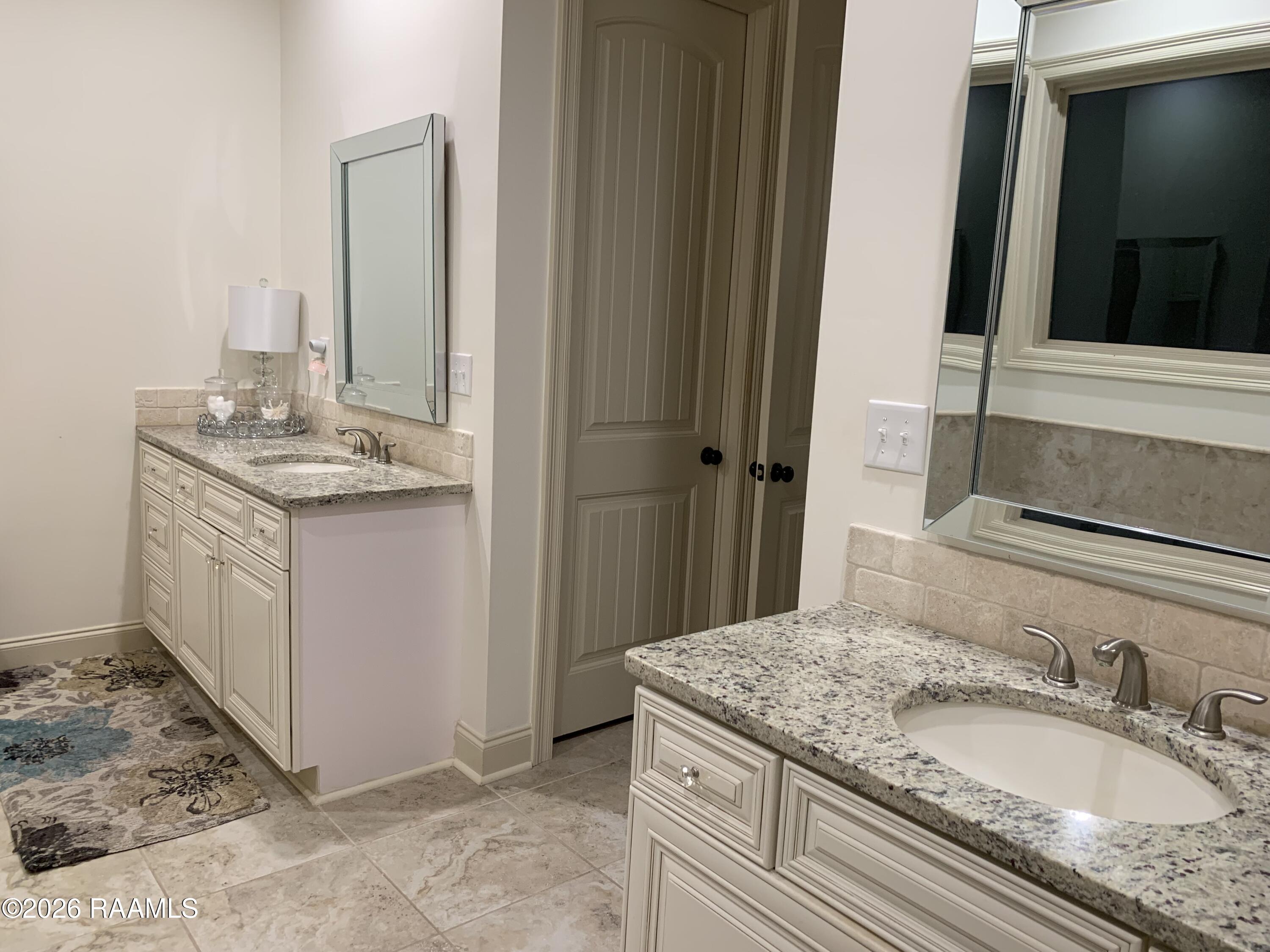 115 Sugar Ridge Lane Youngsville, LA 70592 - Photo 10 of 31 Primary Bathroom Double Vanities