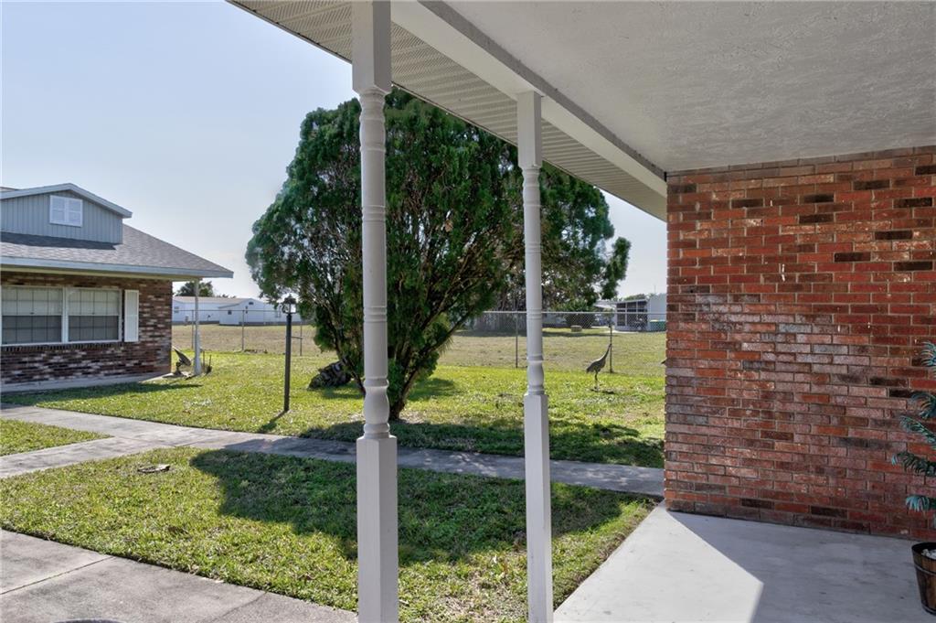 8520 Highway 1, Unit 11 Sebastian, FL 32976 - Photo 6 of 21 a view of a porch in front of house