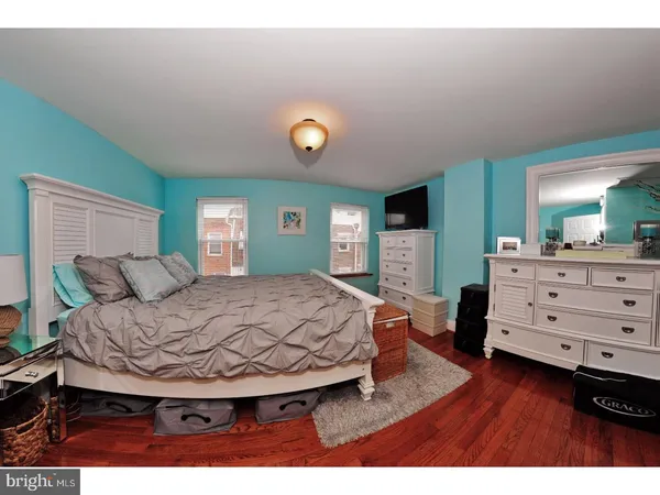 a bedroom with furniture and a couch