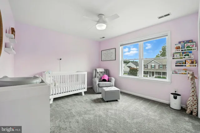 a living room with furniture and window