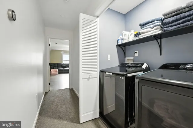 a kitchen that has a sink and a stove