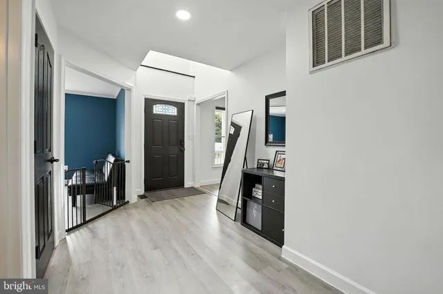 a way to rooms with wooden floor