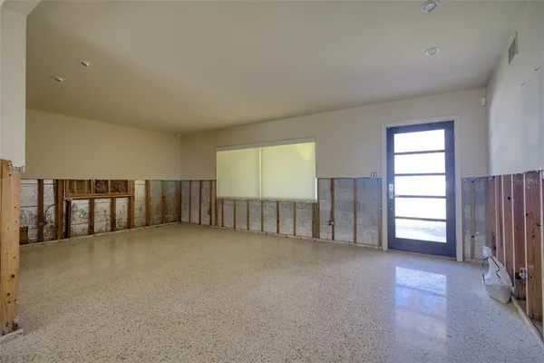 an empty room with windows