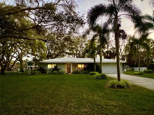 a view of a house with a big yard