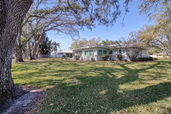 a view of a house with a big yard