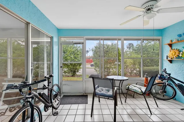 a workspace with furniture and windows