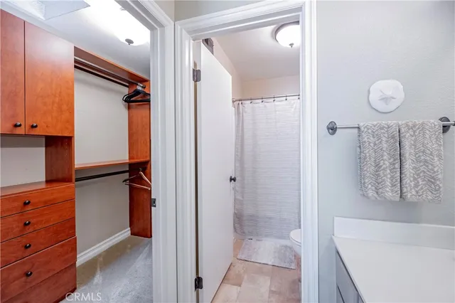 a bathroom with a tub and shower