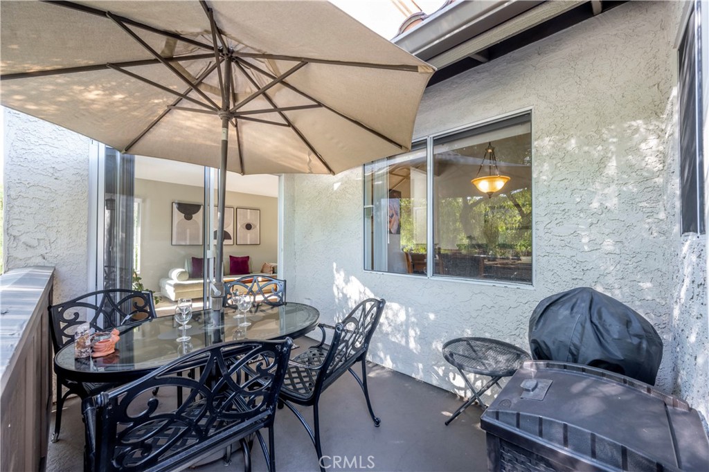 10 Corniche Drive, Unit E Dana Point, CA 92629 - Photo 23 of 25 a view of a dining room with furniture and window
