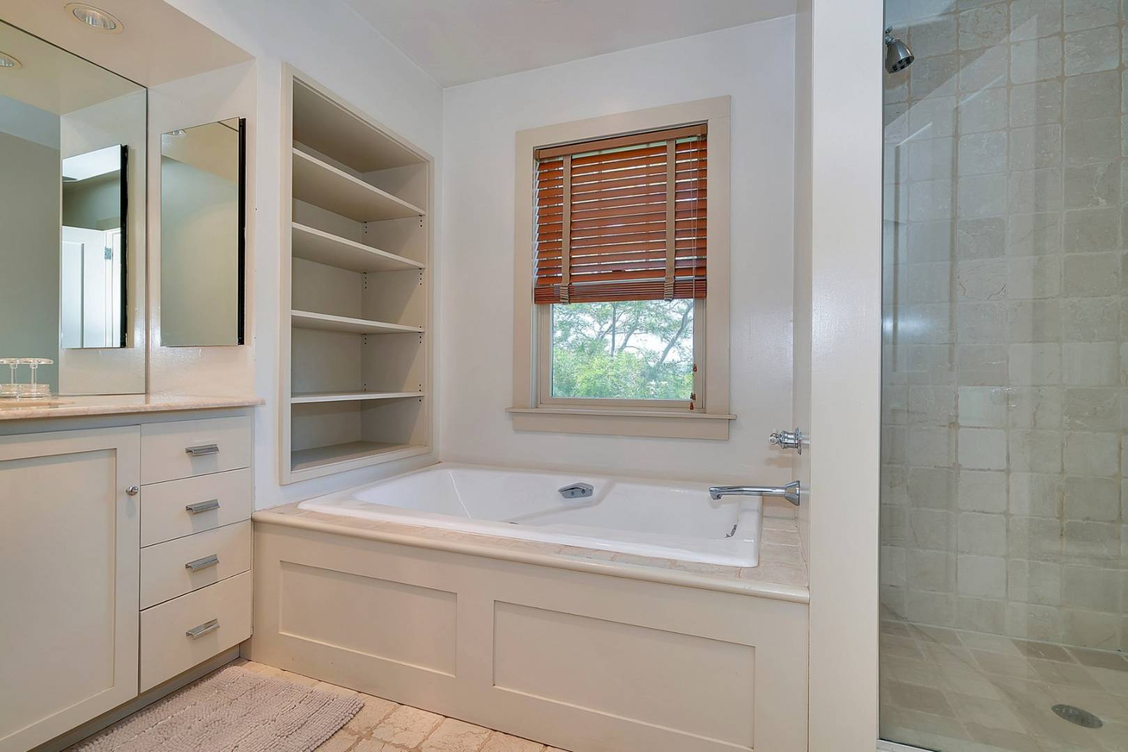 760 North Sea Mecox Road Southampton, NY 11968 - Photo 13 of 24 a bathroom with a sink and a window