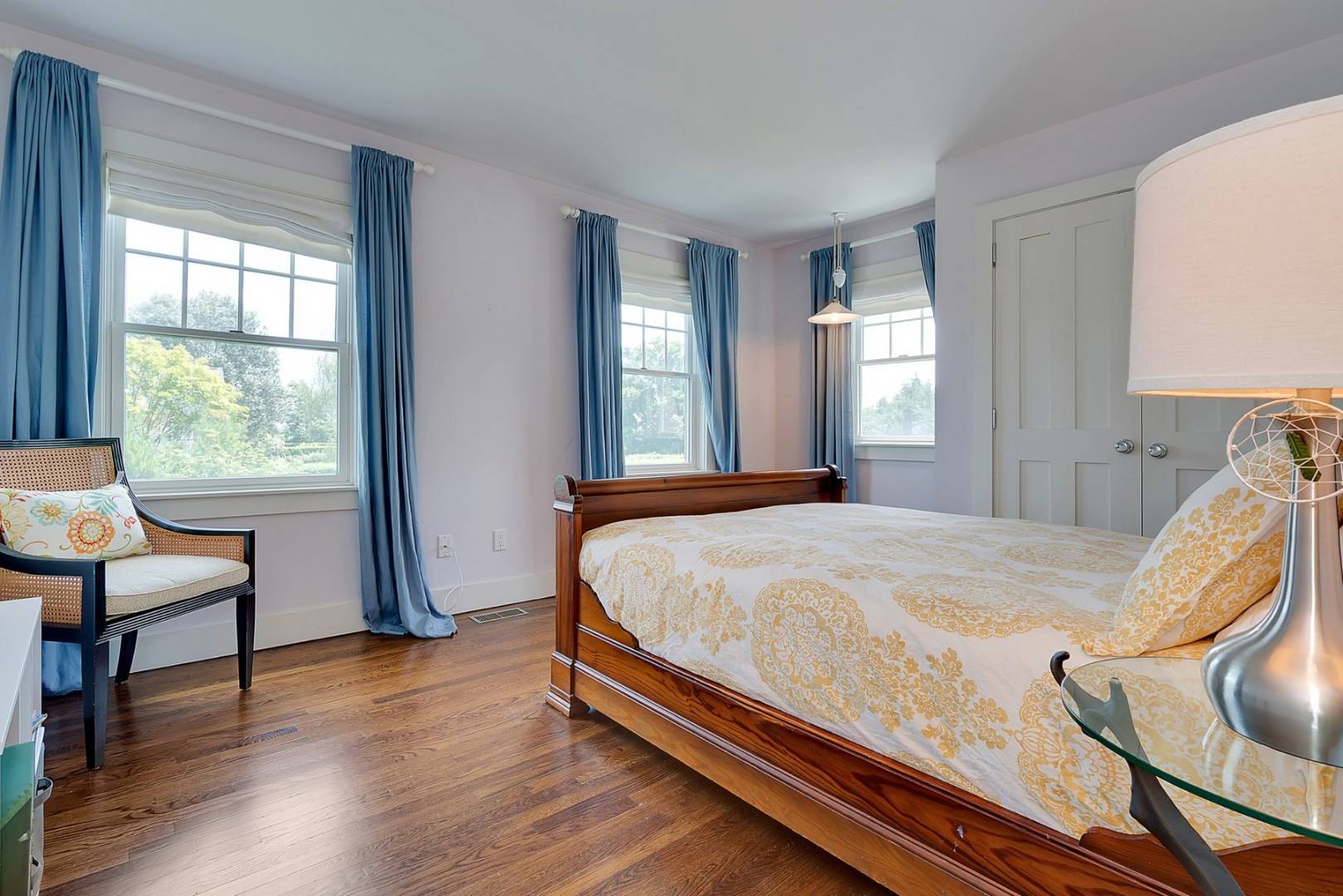 760 North Sea Mecox Road Southampton, NY 11968 - Photo 15 of 24 a bed sitting in a spacious bedroom next to a window