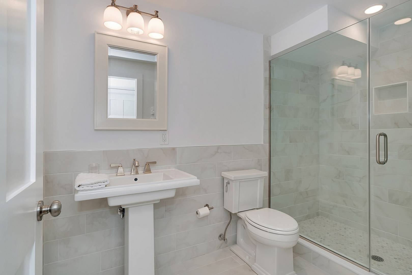 760 North Sea Mecox Road Southampton, NY 11968 - Photo 21 of 24 a bathroom with a sink toilet and shower