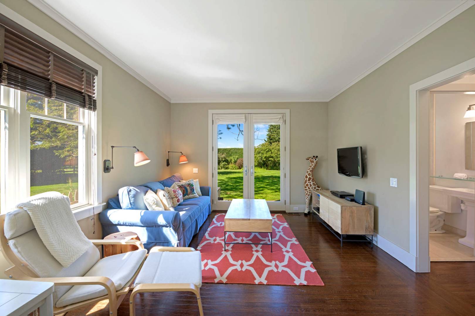 760 North Sea Mecox Road Southampton, NY 11968 - Photo 8 of 24 a living room with furniture and a flat screen tv