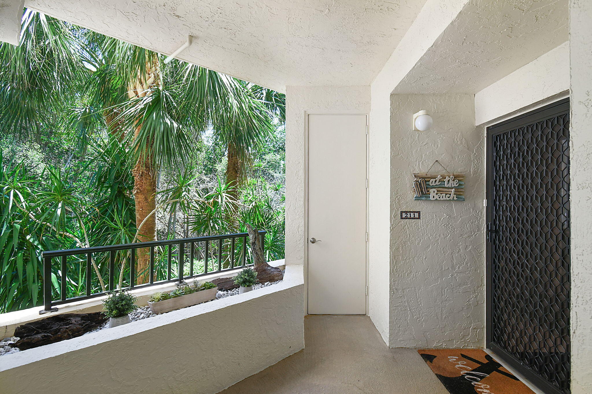 221 Northeast Plantation Road, Unit 211 Stuart, FL 34996 - Photo 6 of 32 Front door