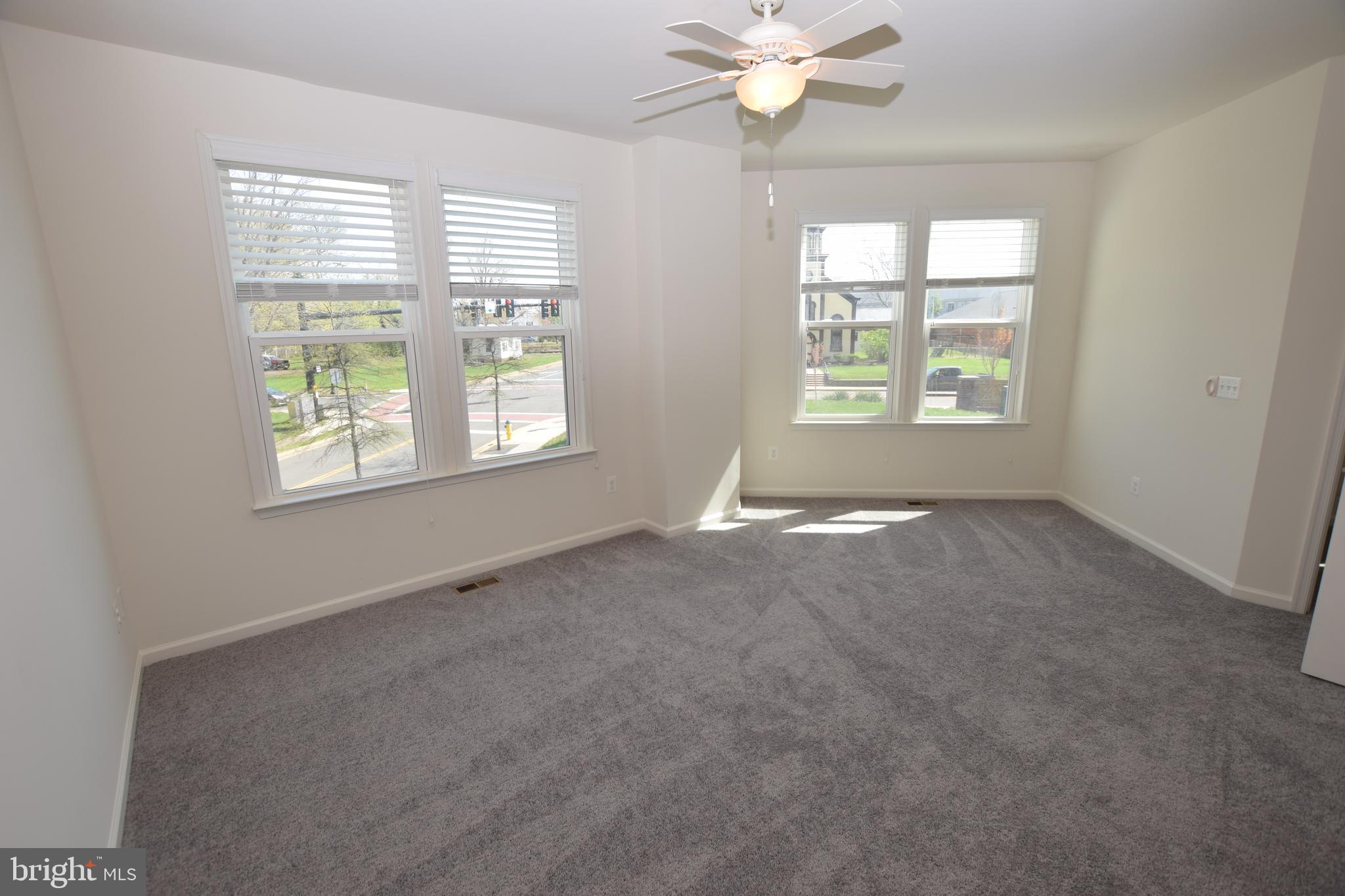 8922 Center Street Manassas, VA 20110 - Photo 12 of 24 a view of an empty room with a window