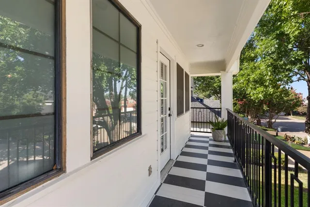 a view of a porch with wooden floor and outdoor space
