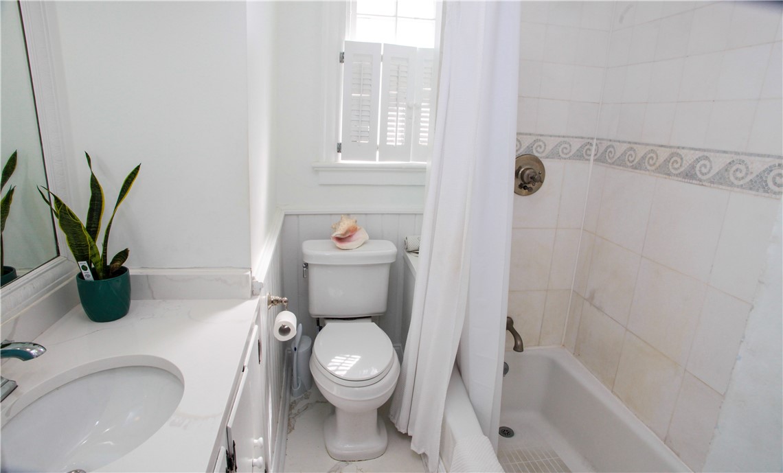 34 Bull Street Newport, RI 02840 - Photo 15 of 34 Mosaic wave tile and a slab of quartz flooring are quality details