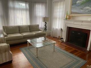 34 Bull Street Newport, RI 02840 - Photo 23 of 34 The Bay window, hardwood floors and fireplace welcome you into Unit 1