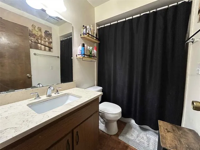 a bathroom with a sink and a toilet