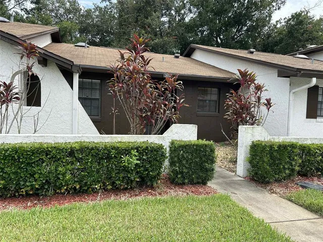 a view of a back yard of the house