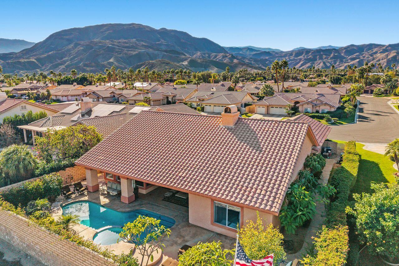 28 White Sun Way Rancho Mirage, CA 92270 - Photo 23 of 43 an aerial view of a house garden and mountain view in back