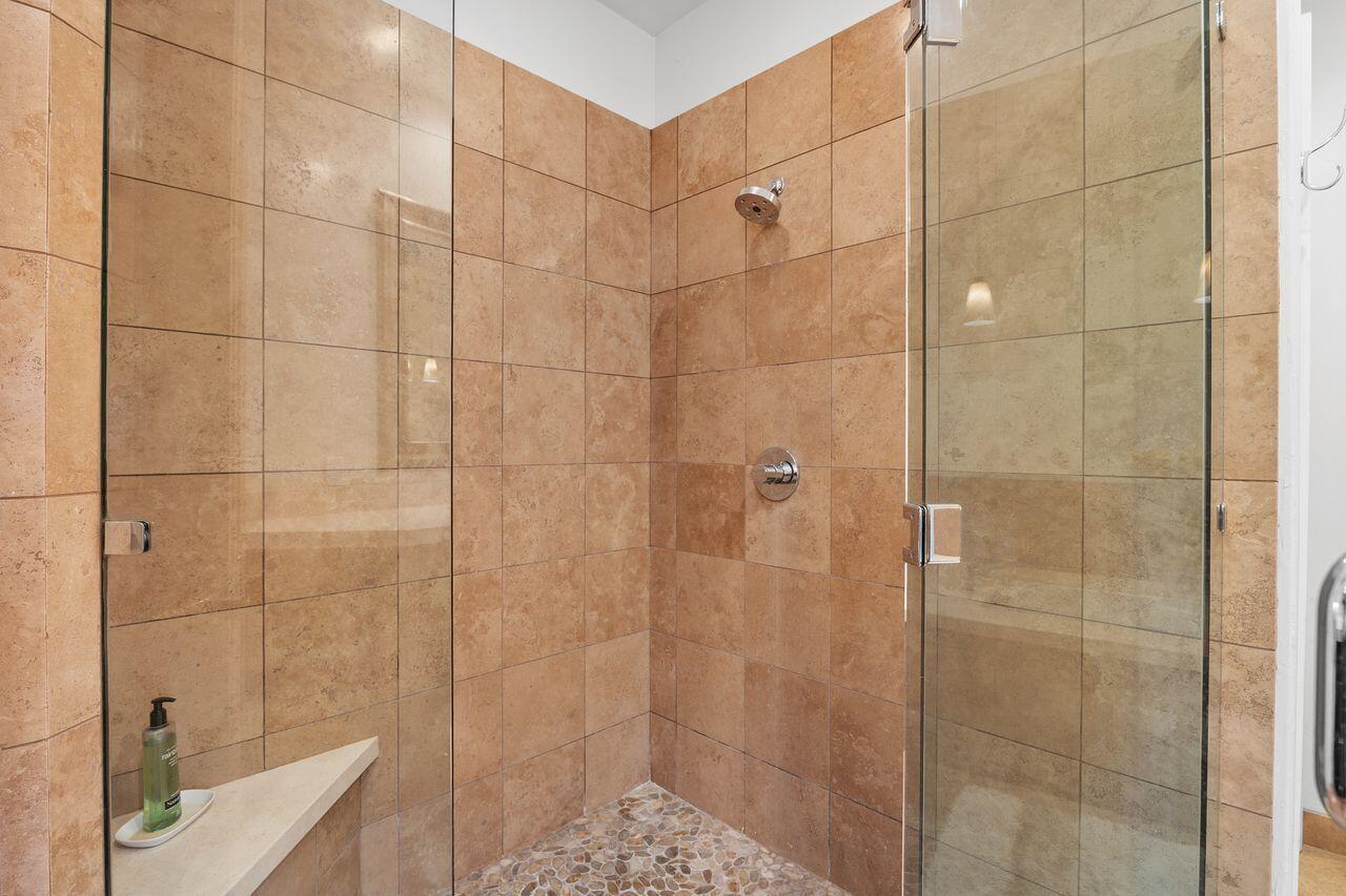 28 White Sun Way Rancho Mirage, CA 92270 - Photo 28 of 43 a bathroom with a shower and a sink