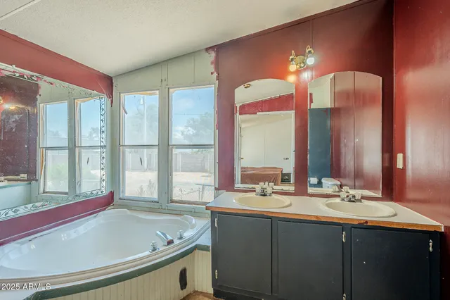 a bathroom with a shower and a glass door