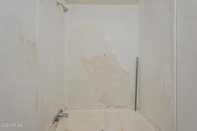 a view of a room with racks on the wall