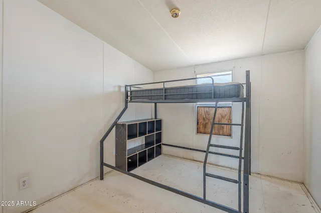 a view of staircase with a rug