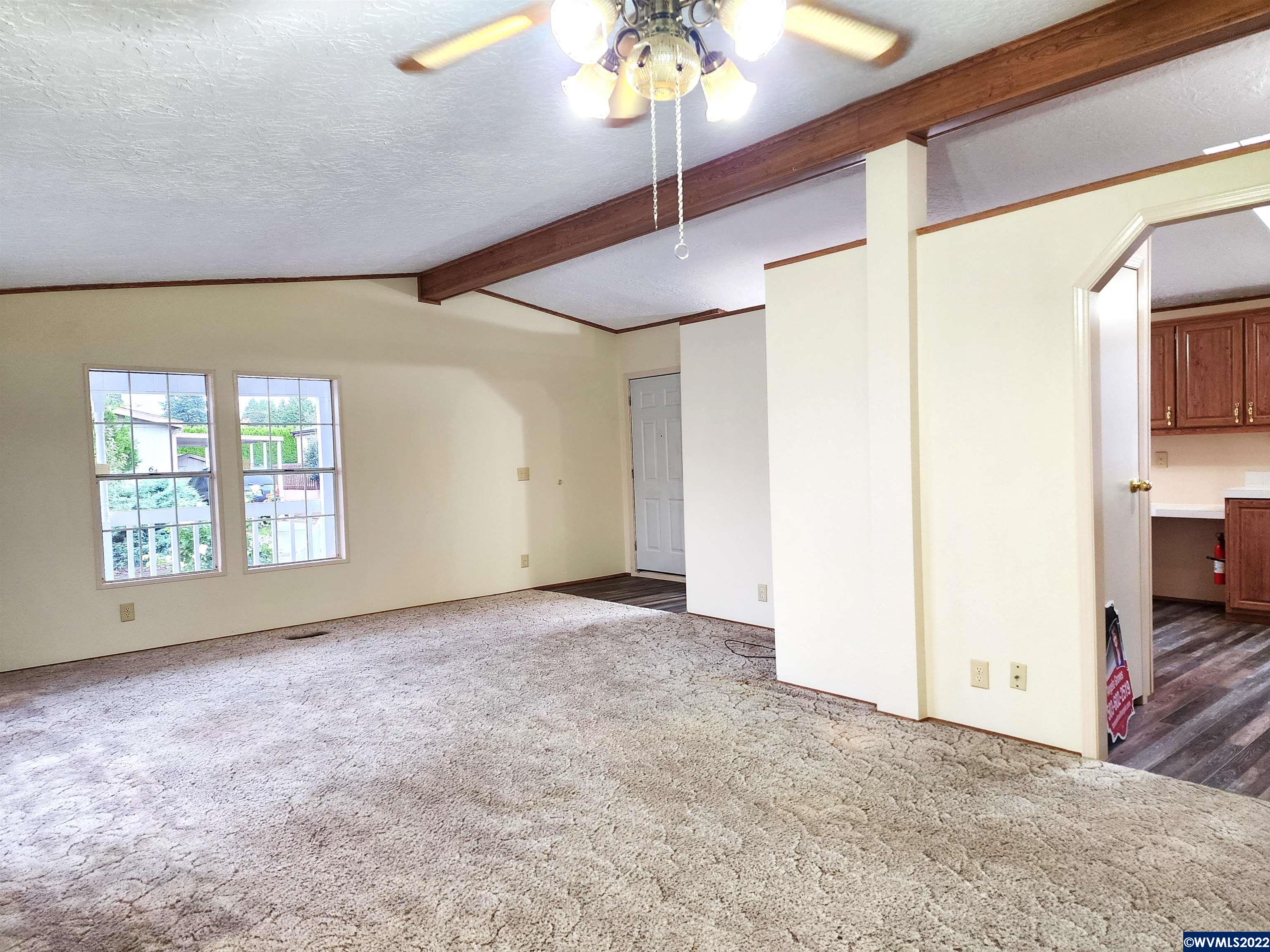 205 Boone Road Southeast, Unit 58 Salem, OR 97306 - Photo 11 of 19 a view of an empty room with a window