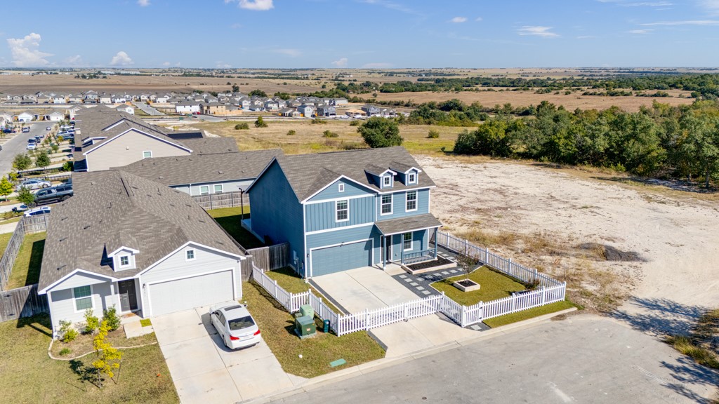 205 Rooster Way Jarrell, TX 76537 - Photo 27 of 29 Aerial perspective of suburban area