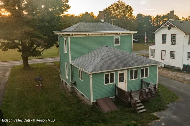 a house view with a garden space