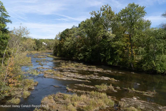 a view of a road with an outdoor space