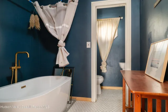 a bathroom with a bathtub