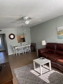 a kitchen with white cabinets and a sink