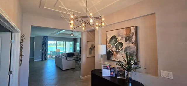 a view of a entryway and a livingroom