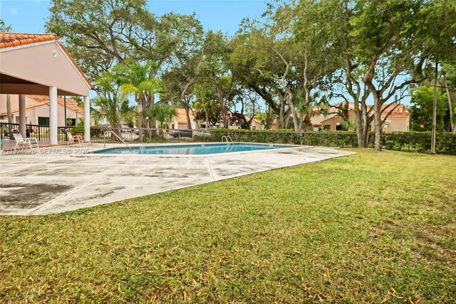 a view of an outdoor space and swimming pool