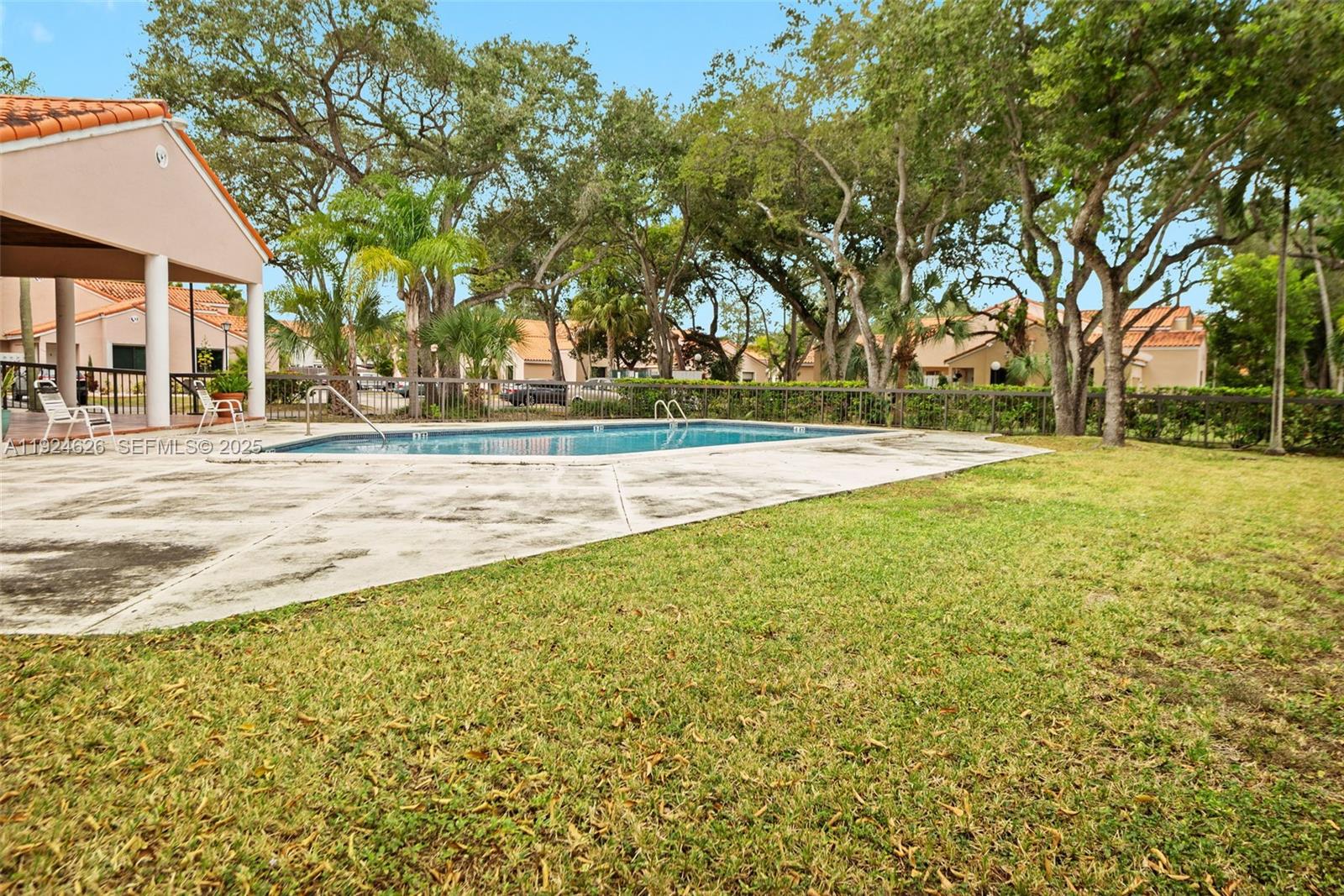 11840 Southwest 80th Street, Unit 526 Miami, FL 33183 - Photo 24 of 25 a view of an outdoor space and swimming pool