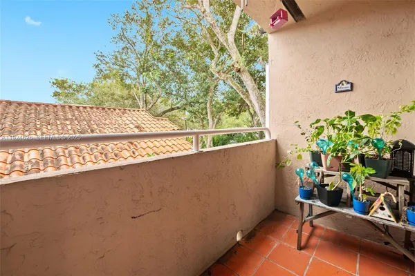 a view of outdoor space and yard from the balcony